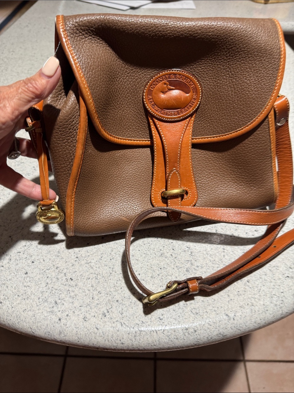 Dooney & Bourke Brown Pebbled Leather Messenger with Tan Trim